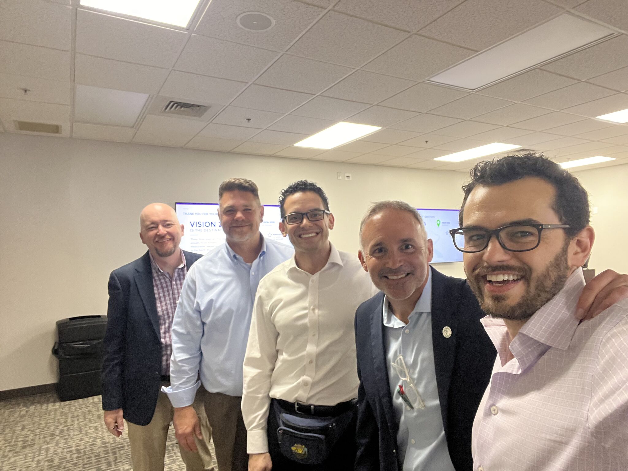 Del-One Federal Credit Union leaders with Shastic founder Joseariel Gomez at a strategic planning session